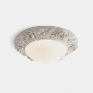 Blancora hand-carved floral flush mount ceiling light with frosted glass dome and warm white integrated LED, close-up studio view