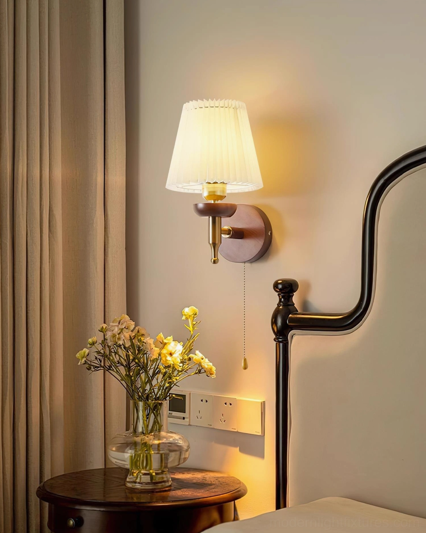 Blixen pleated wall sconce showing 40W incandescent or LED equivalent bulb capacity