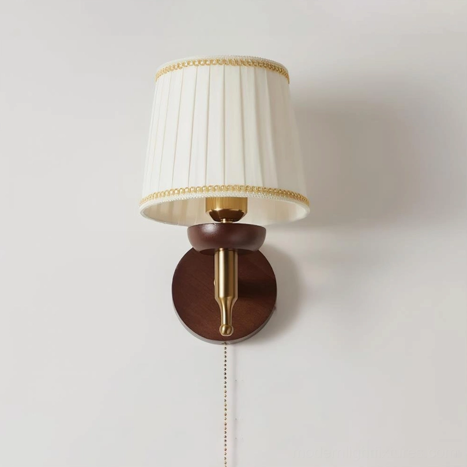 Blixen wall lamp with pull-chain switch and brass hardware mid-century modern design
