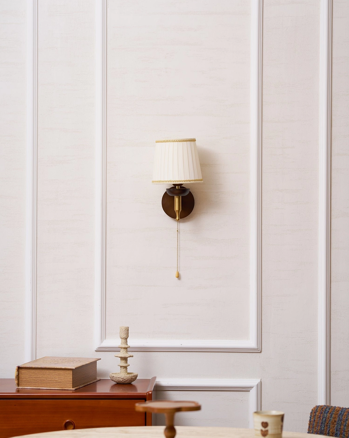 Blixen wall sconce entryway accent lighting creating warm welcoming first impression