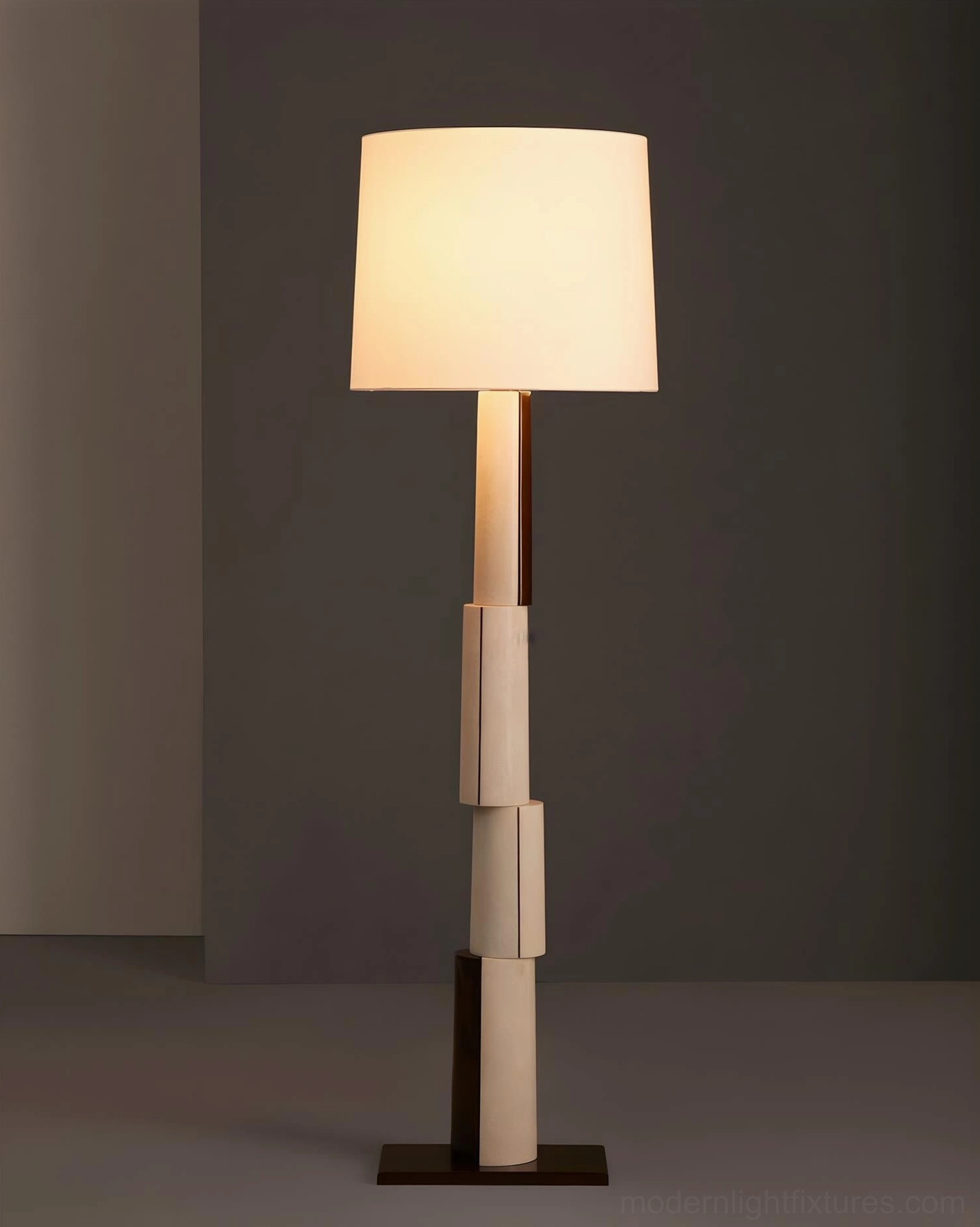 Illuminated block floor lamp with warm ambient glow and two-tone segmented pole - contemporary luxury lighting design