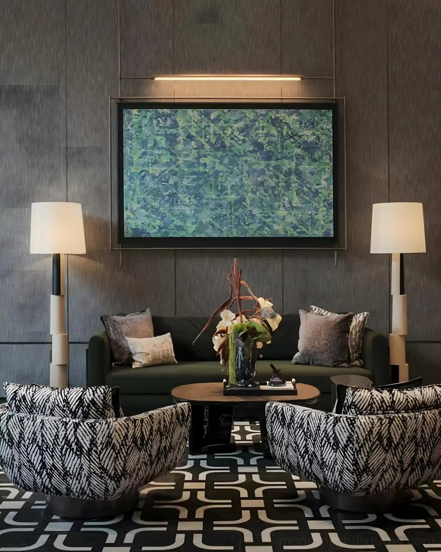 Pair of contemporary block floor lamps in modern living room with green sofa and patterned lounge chairs - luxury interior design styling