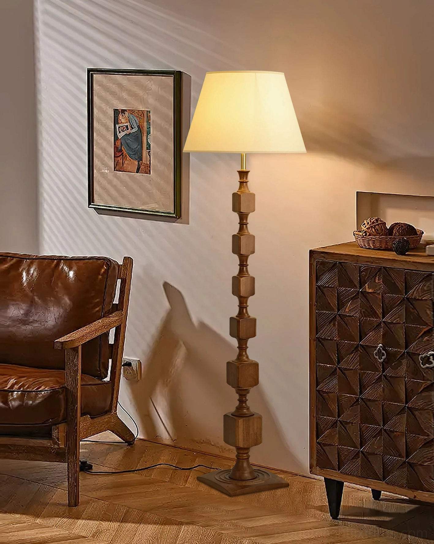 Blockora floor lamp illuminated in evening room setting, demonstrating warm fabric shade diffusion and ambient glow in modern interior