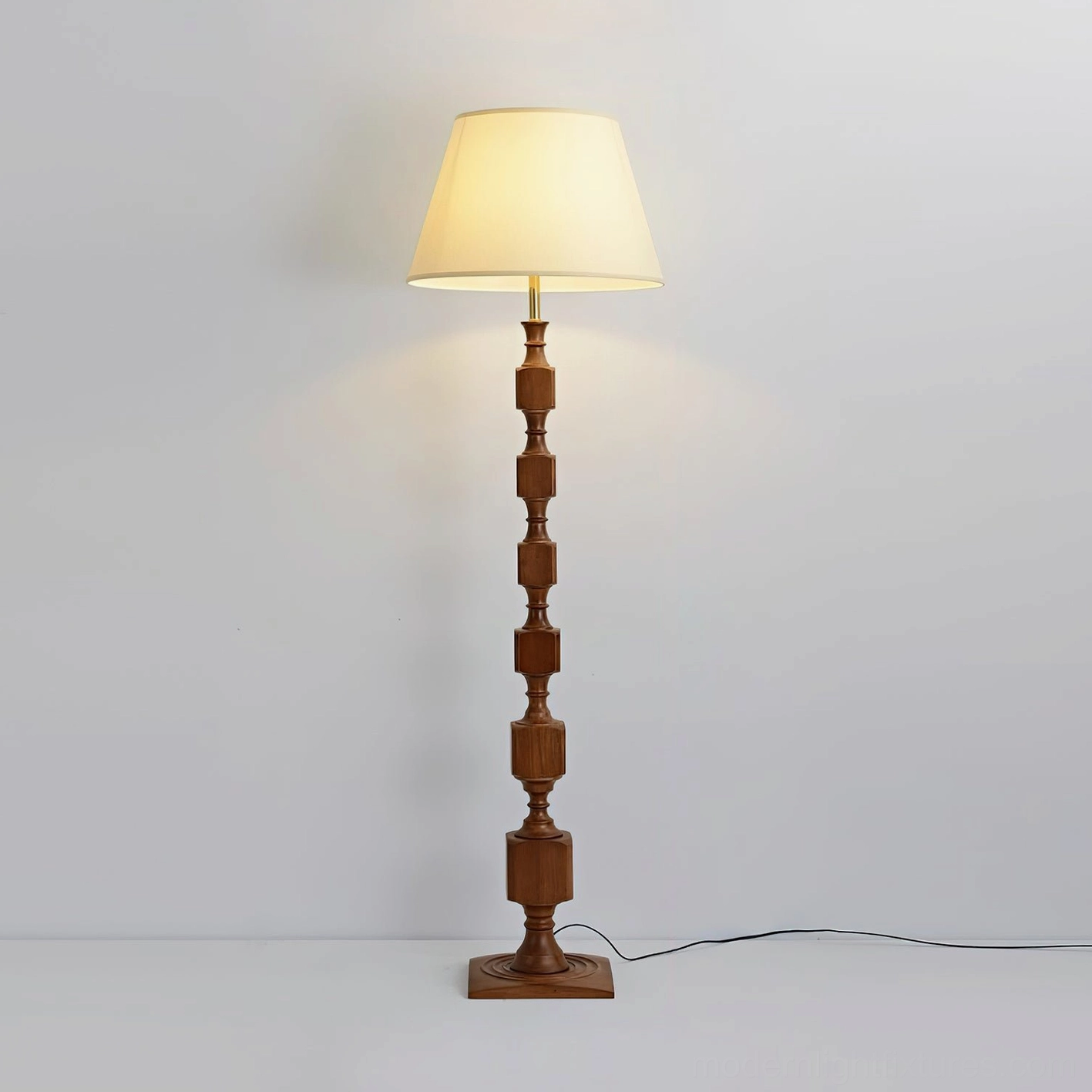 Blockora floor lamp in natural wood tone positioned in Scandinavian interior setting, complementing minimalist Nordic design aesthetic and furnishings
