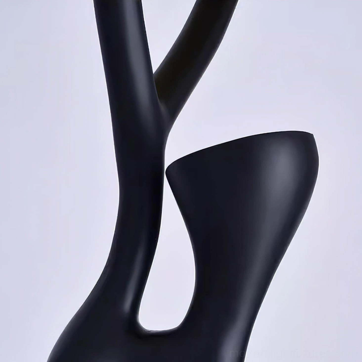 Blonski sculptural floor lamp base and placement in modern living room corner arrangement