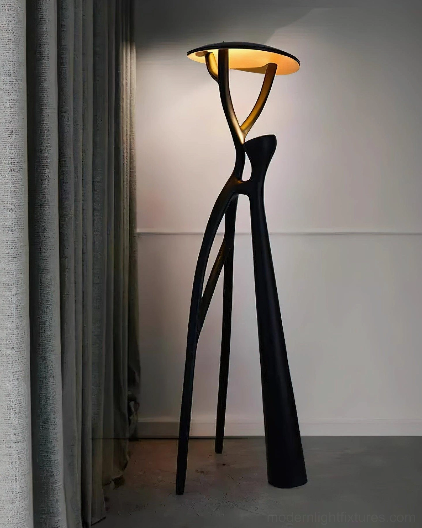 Blonski floor lamp styling in luxury apartment living area, matte black sculptural statement piece