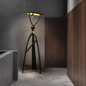 Blonski sculptural floor lamp in modern minimalist hallway, warm ambient lighting, contemporary architecture