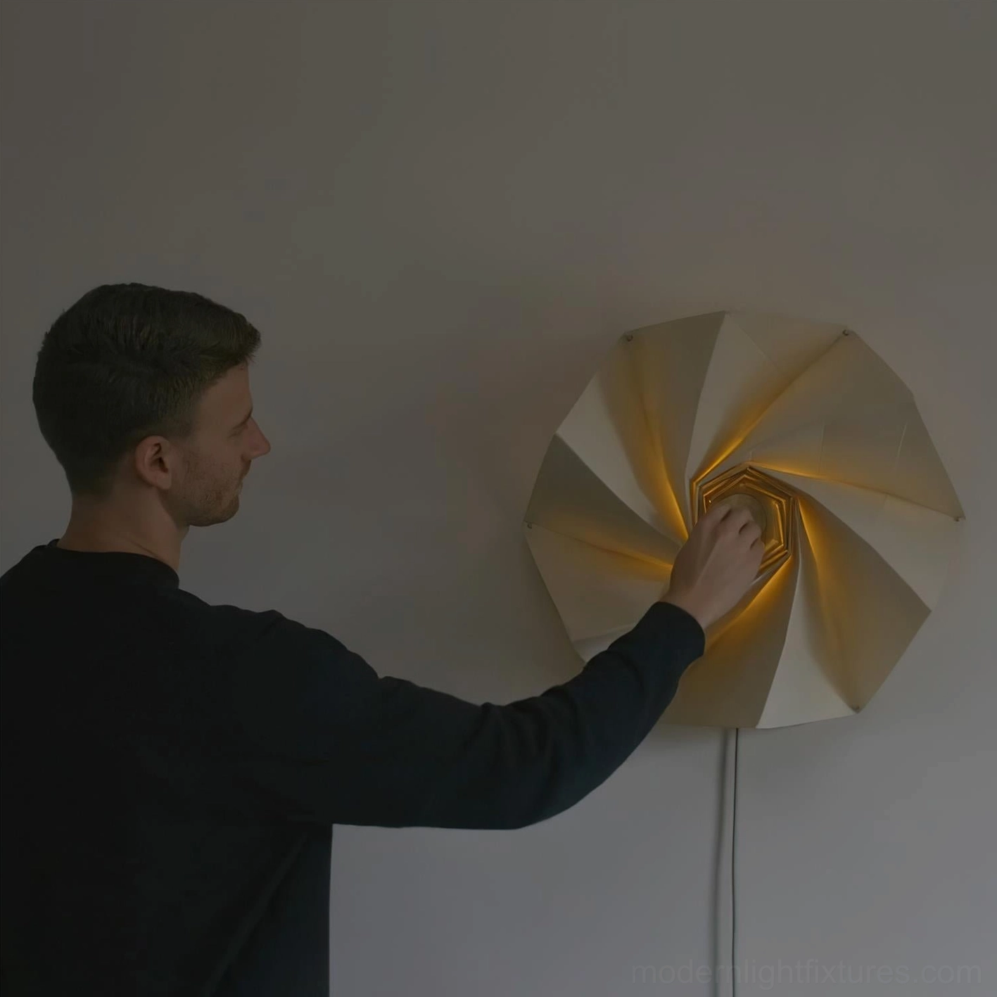 Hand adjusting Bloom contemporary wall lamp spiral shade expansion mechanism in residential interior