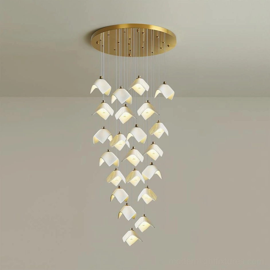 Close-up view of cascading bloom chandelier showing brush gold canopy and cascading bell-shaped ceramic elements
