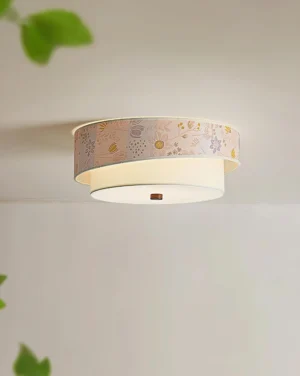 Illuminated Bloomfield floral ceiling light fixture showing soft light diffusion through fabric drum shade