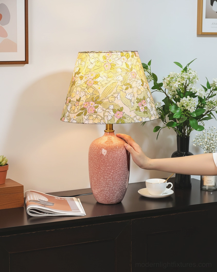 Bloomora table lamp close-up showing floral fabric shade texture and ceramic base craftsmanship