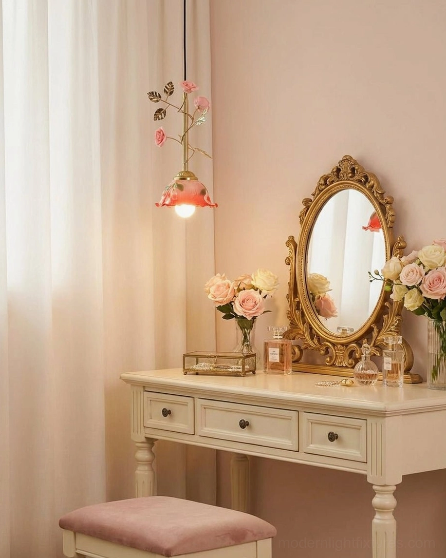 Bloomvelle floral pendant light above makeup vanity with gold ornate mirror and feminine decor