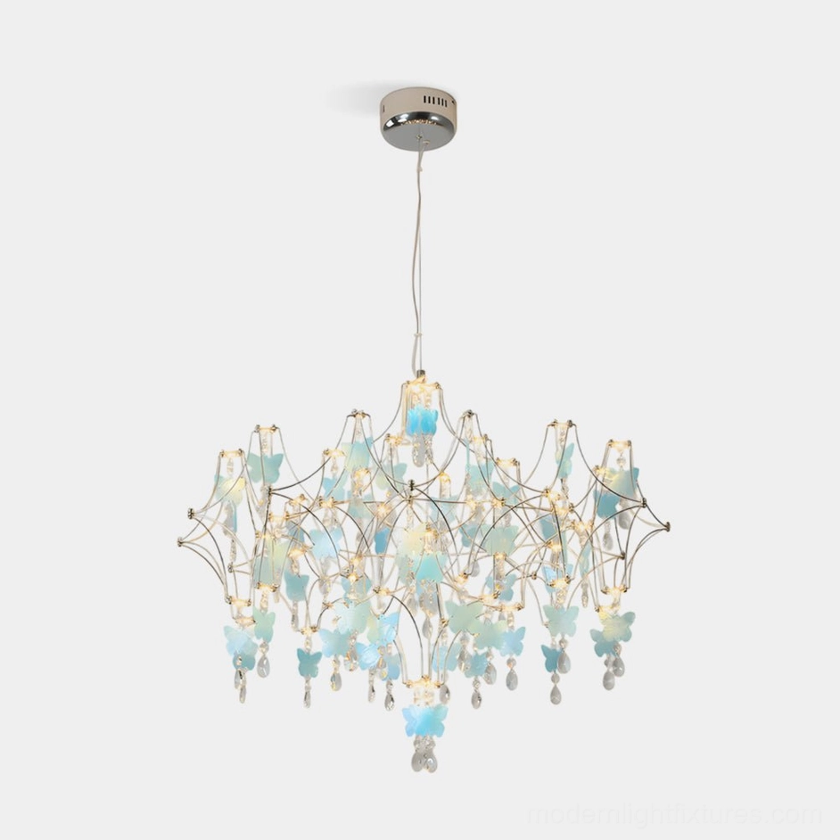 Blue butterfly dream crystal chandelier with handcrafted metal frame and shimmering crystal droplets against white studio background, demonstrating elegant modern luxury lighting design