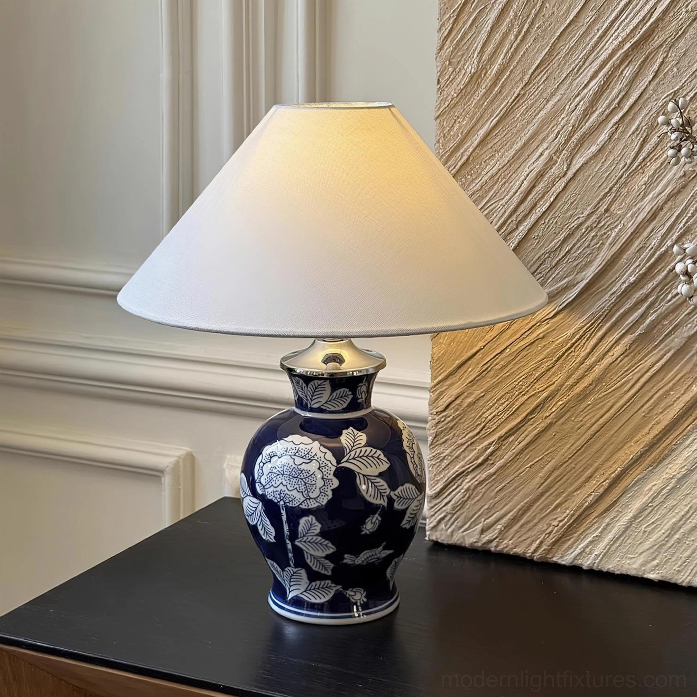 Blue ceramic floral table lamp with white flower pattern, fabric shade suitable for bedside console table placement