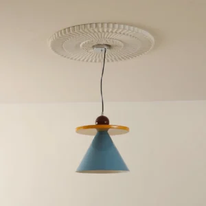 Modern blue conical pendant lamp with yellow accent ring, low-angle ceiling installation view in warm residential interior