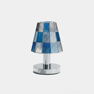 Geometric stained glass table lamp with blue checkered shade and polished chrome base, front studio view
