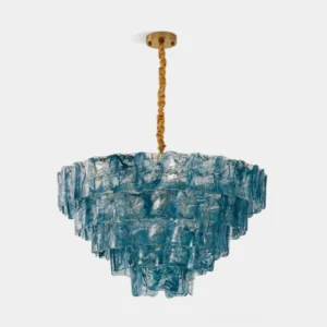 Blue tiered glass chandelier with brass frame, front view product shot showcasing wavy textured glass panels and modern architectural design