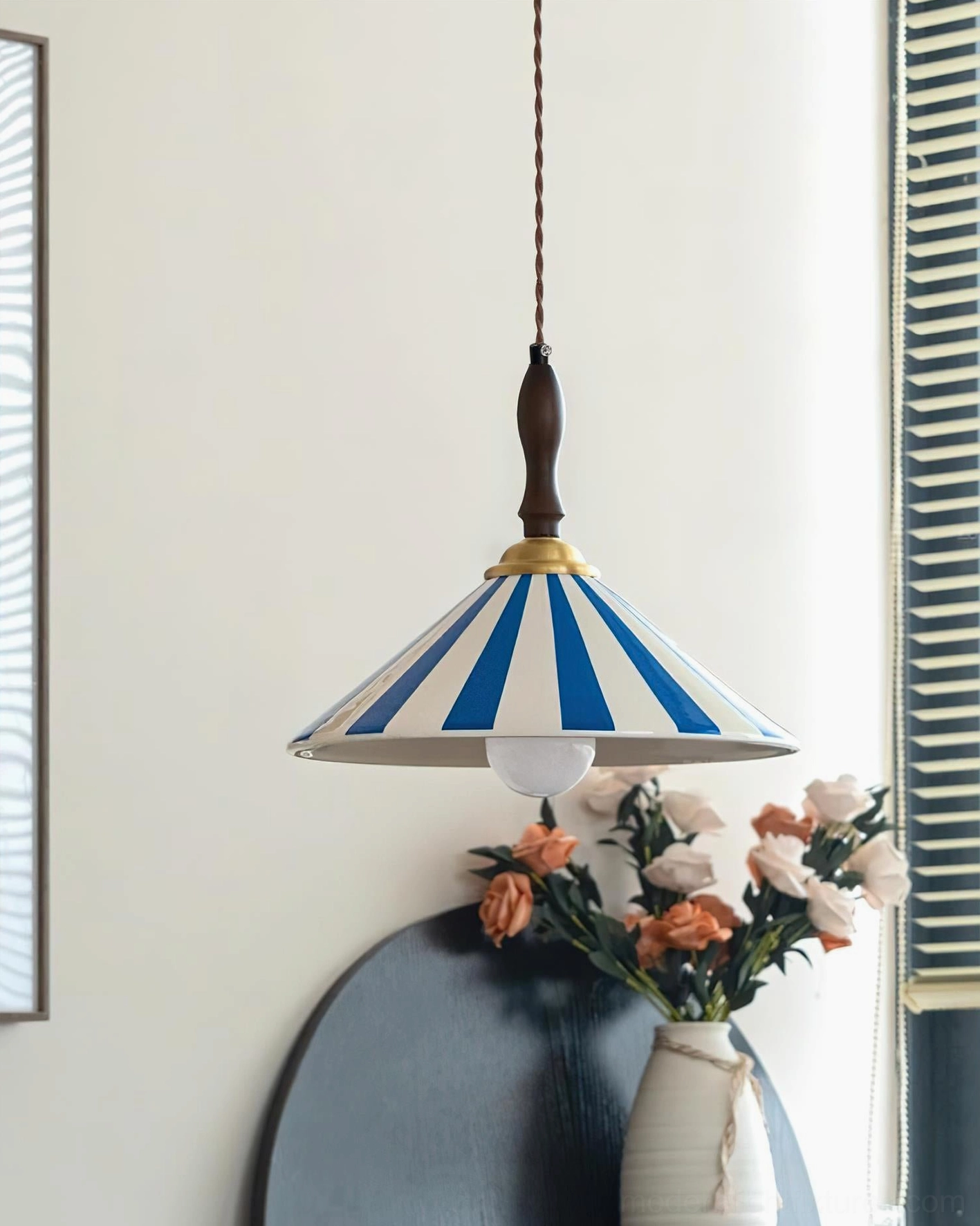 Blue striped vintage pendant lamp three-quarter angle view showing twisted fabric cord and ceramic shade detail with home decor accessories