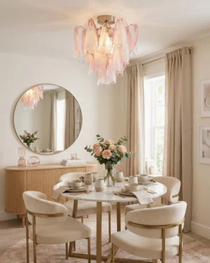 Bluselle ceiling light installed in elegant formal dining room with marble table and round mirror - modern romantic interior design