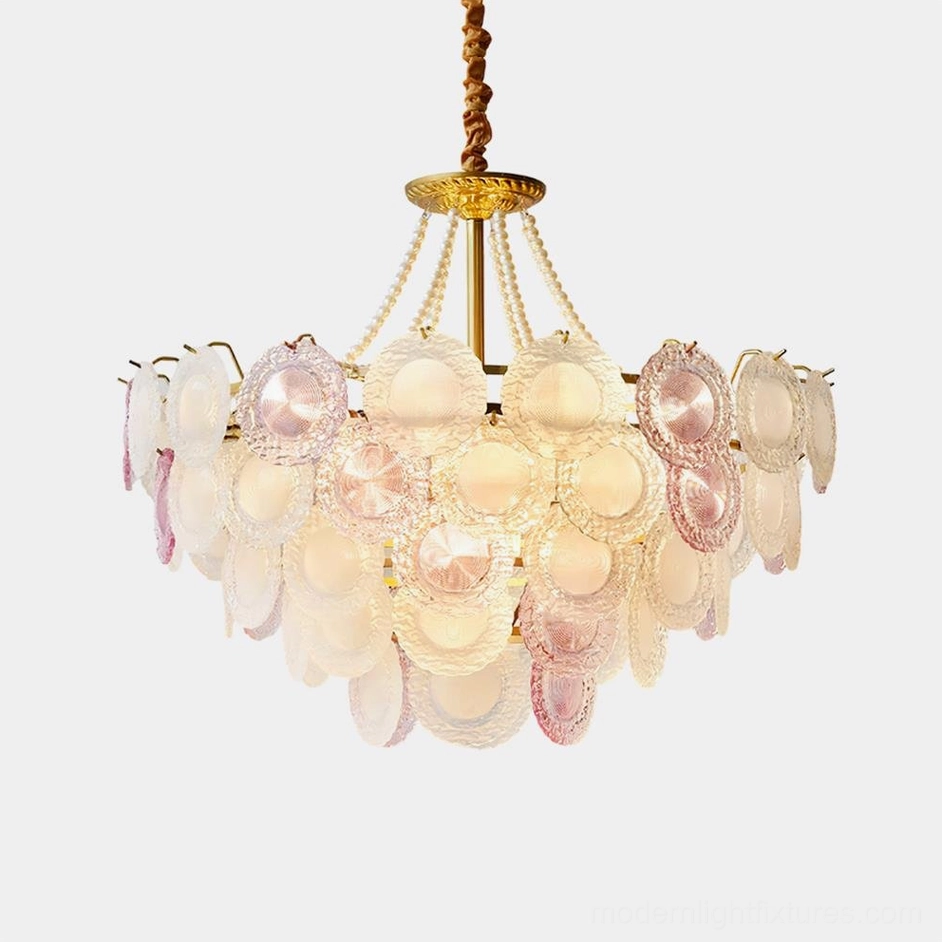 Violaire blush pink glass chandelier front view studio shot with golden brass hardware and tiered petal glass design