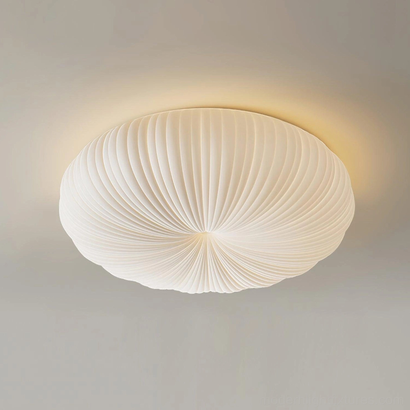 Bobby small 45cm diameter modern flush mount ceiling light installed in compact bedroom space