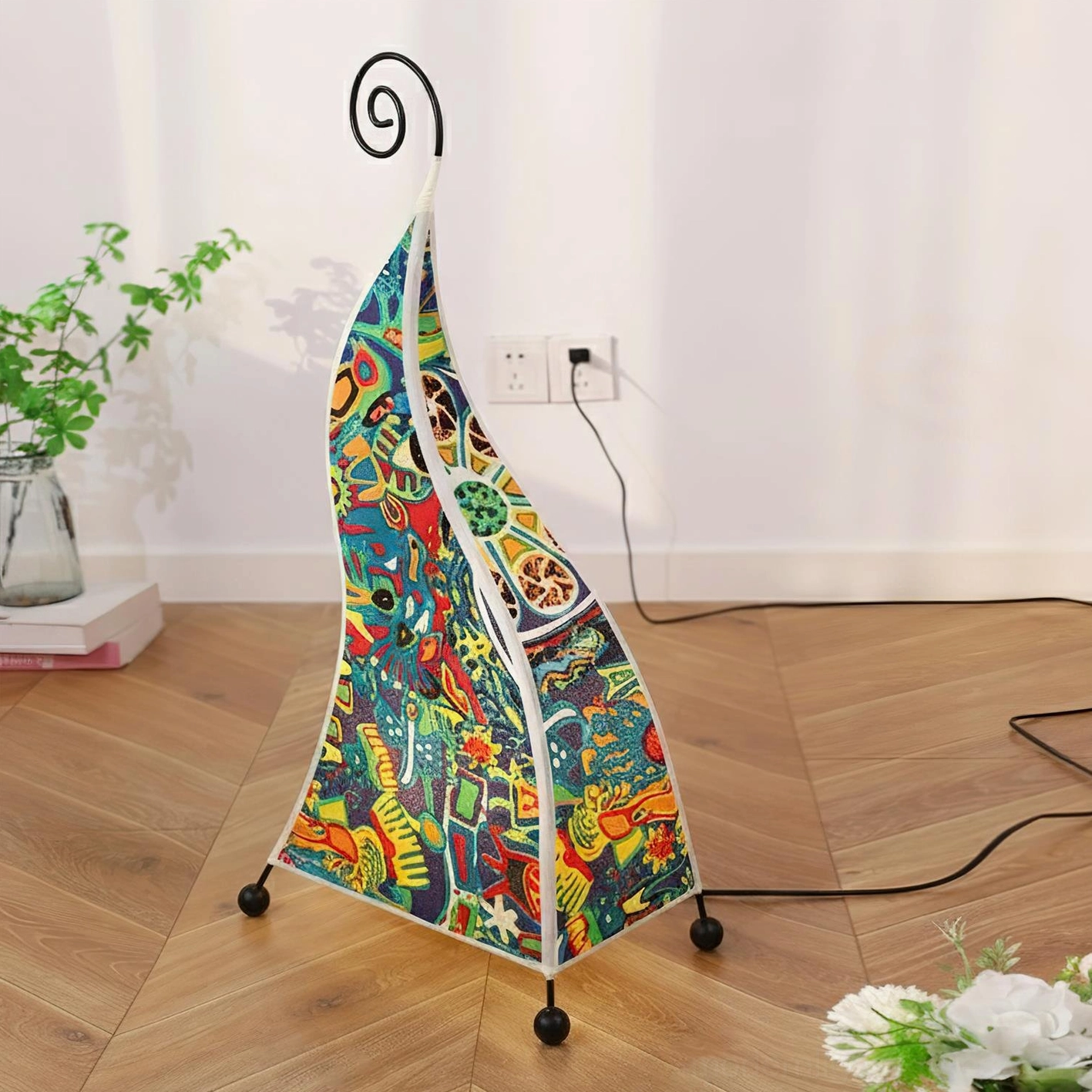 Stained glass style bohemian floor lamp with bold colorful abstract pattern and black rolling metal base