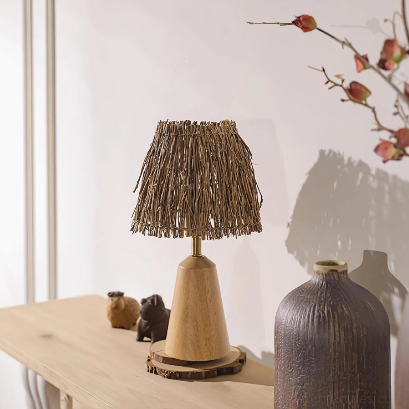 Bohemian woven table lamp displaying warm ambient glow in eclectic bedroom setting