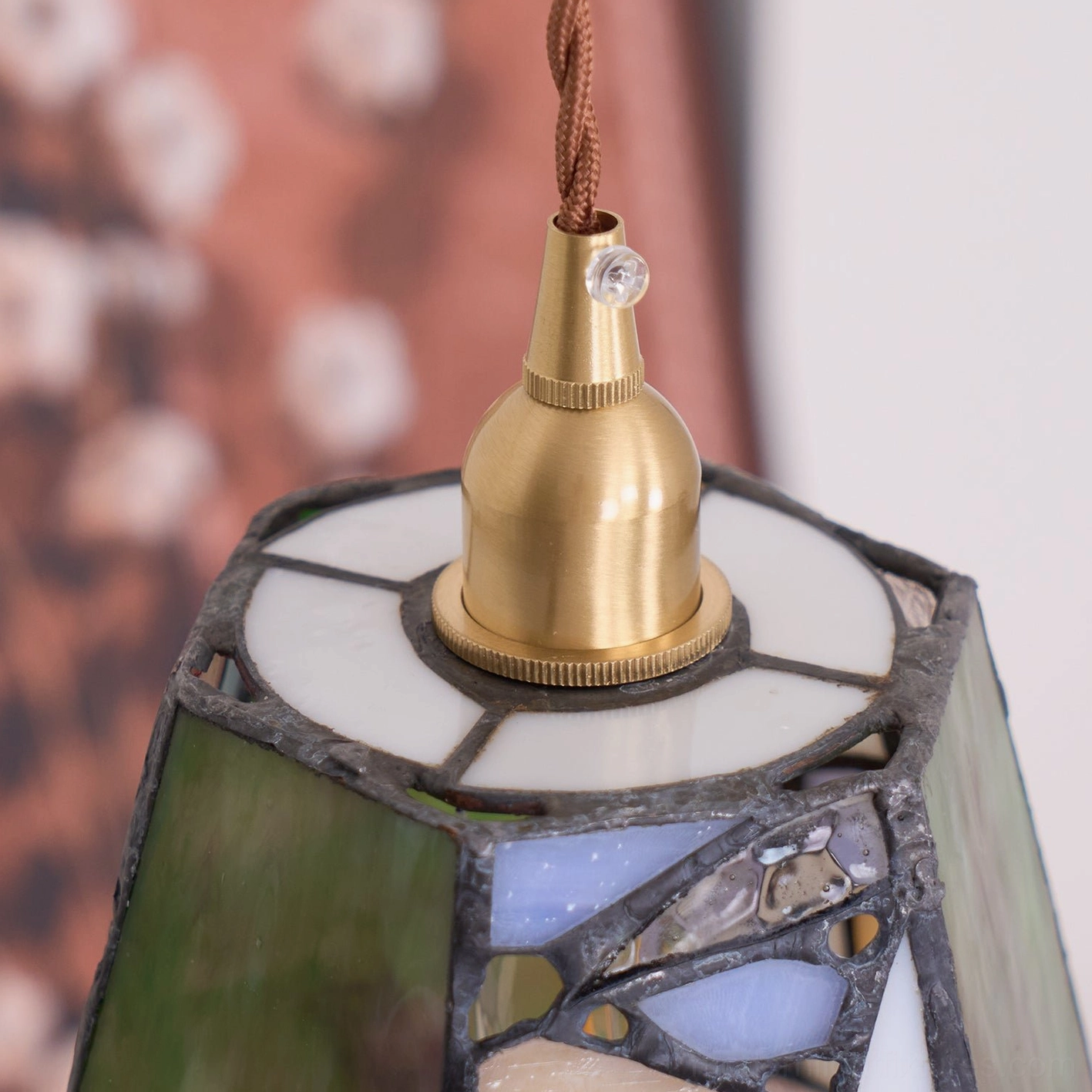 Stained glass pendant light suitable for eclectic bohemian and mid-century modern interior design styles