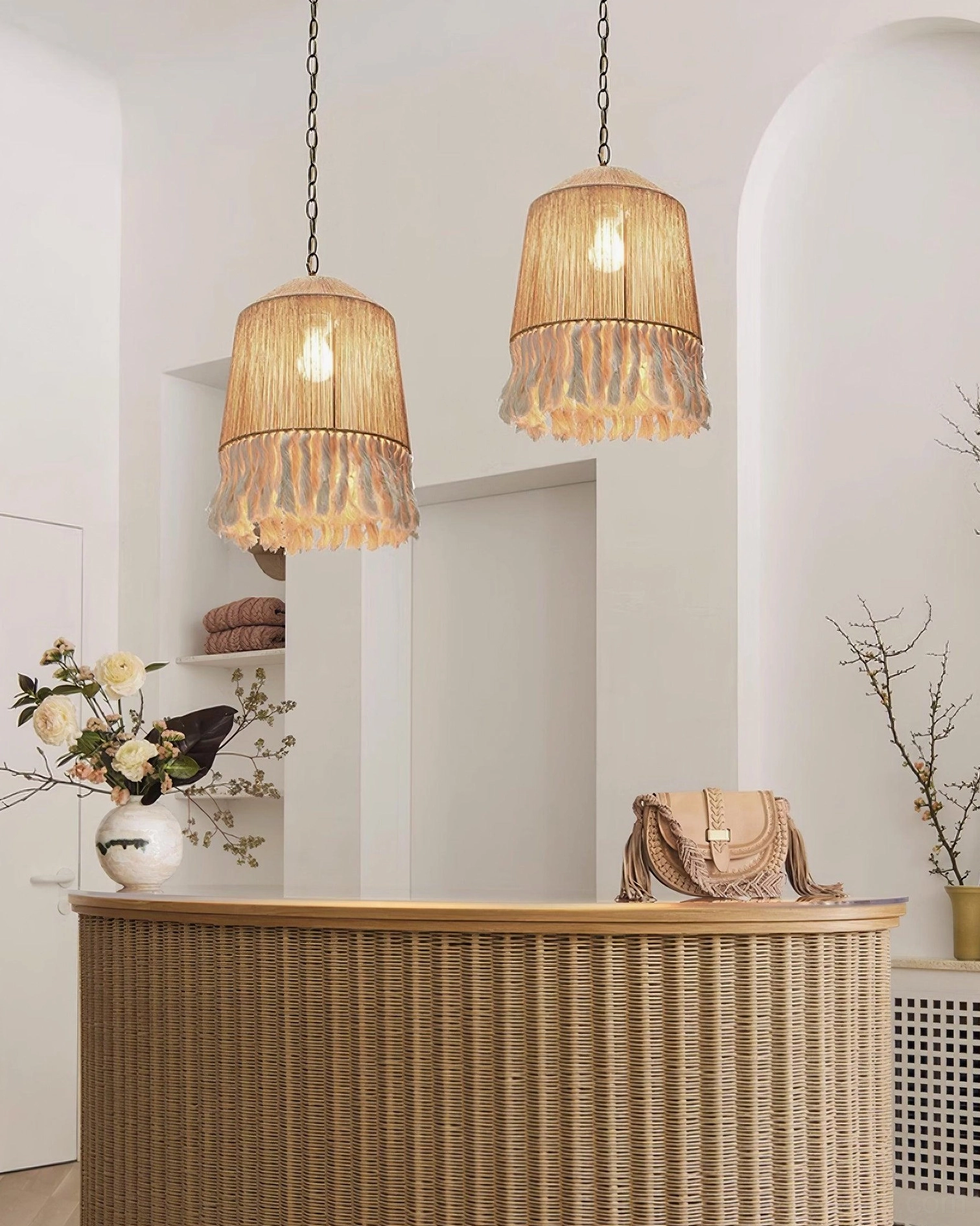 Bohemian pendant lamp showing woven shade texture and flowing hemp rope tassel detail