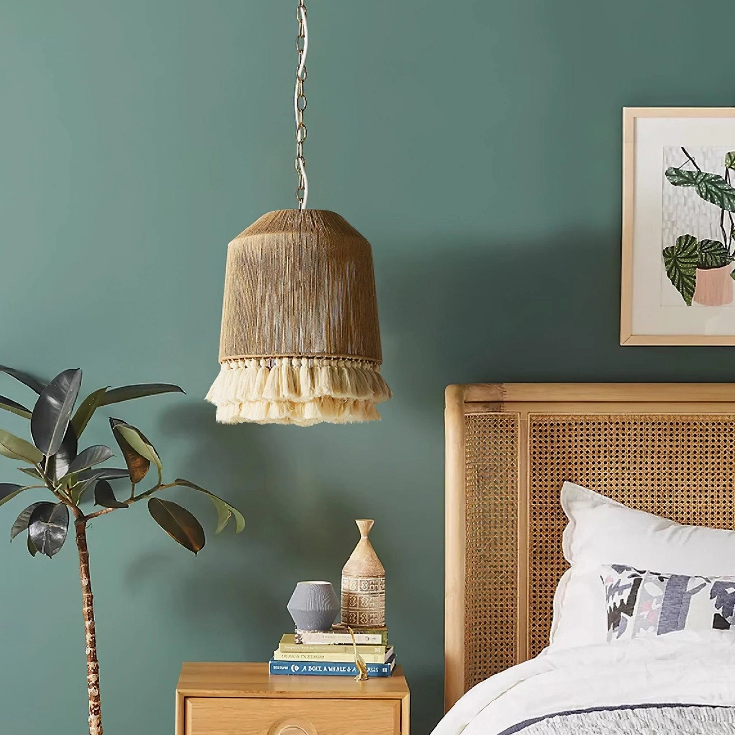 Bohemian tapered tassel pendant lamp in bedroom interior with green wall, warm natural lighting
