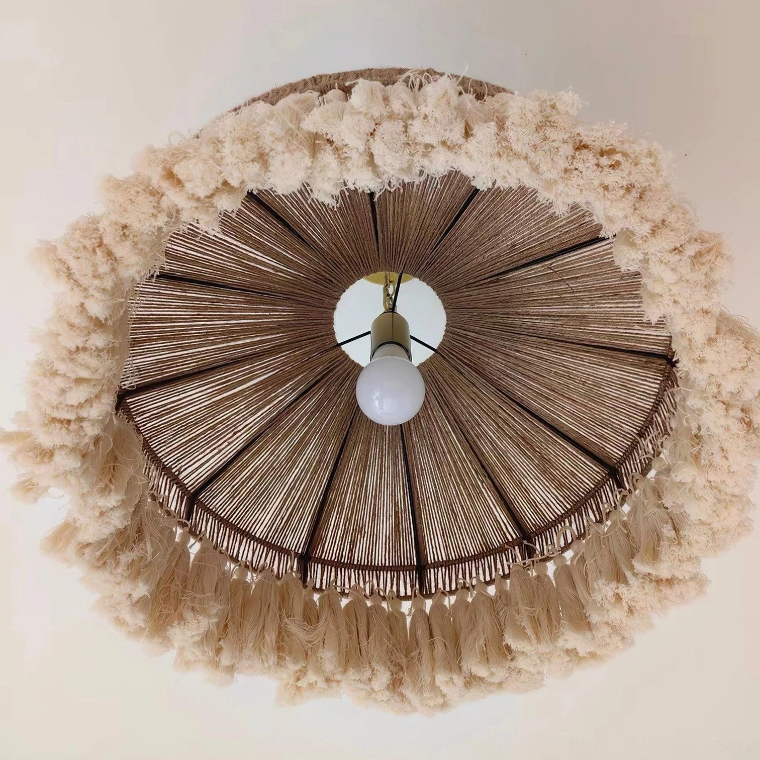 Bohemian fringe tassel pendant lamp installed in modern minimalist interior demonstrating versatile style compatibility with contemporary bohemian design aesthetic