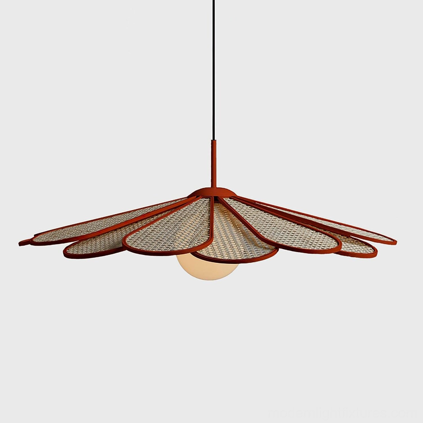 Botanical-inspired rattan pendant lamp showing natural material craftsmanship and organic silhouette