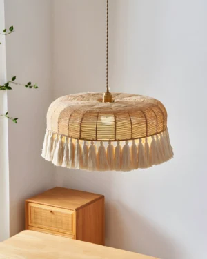 Bohemian rattan pendant lamp styled in dining room with wooden furniture, showcasing warm amber glow and natural texture
