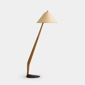 Bolete sculptural wooden floor lamp with black asymmetrical base and hand-stitched conical shade, front three-quarter view