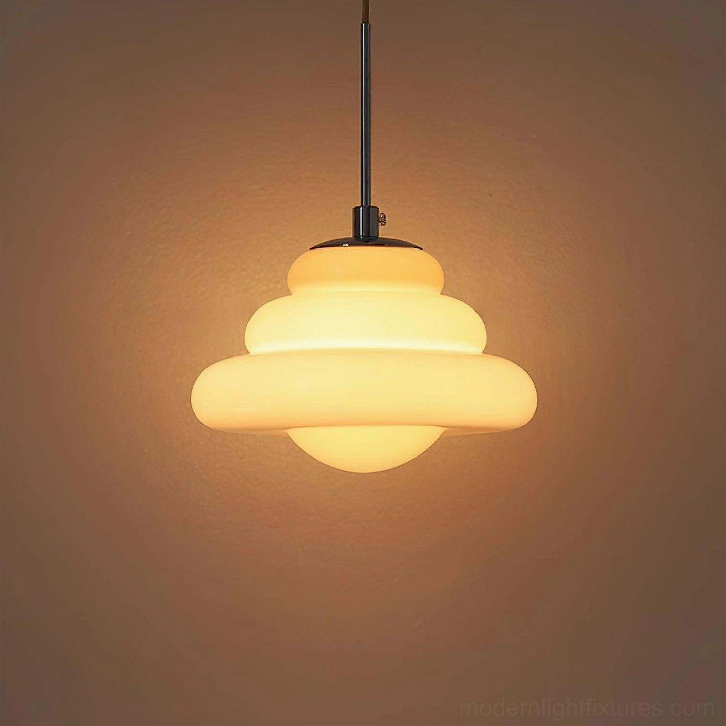 Premium borosilicate glass tiered pendant light with lustrous glossy surface finish