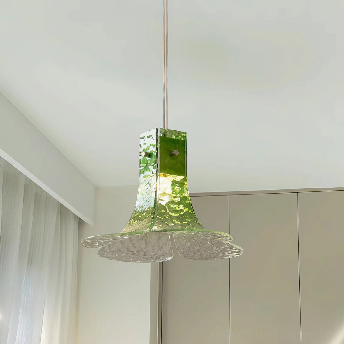 Contemporary floral glass pendant light in modern bedroom with gradient green and clear textured design