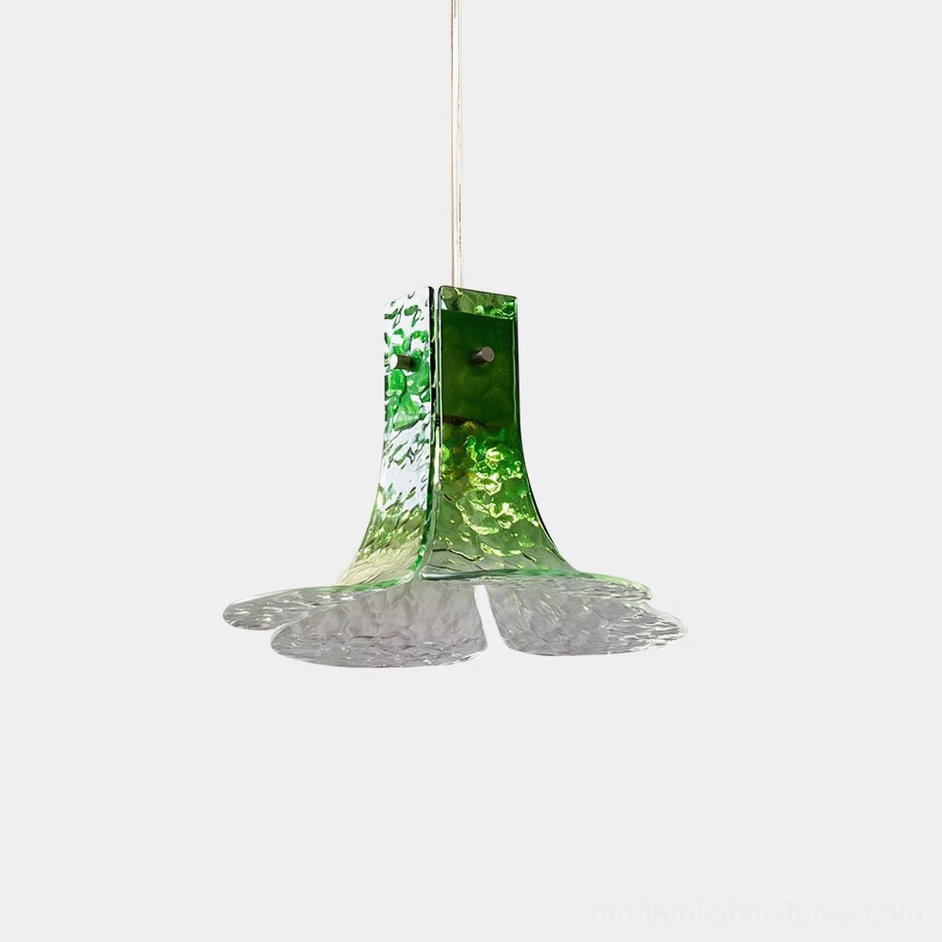 Hand-blown botanical glass pendant light with gradient green crown and clear rippled petal shade, overhead studio view