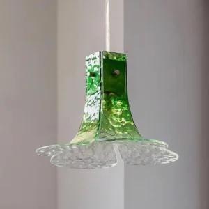 Artisanal floral glass pendant lamp showing metal hardware and hanging cord detail, three-quarter angle perspective