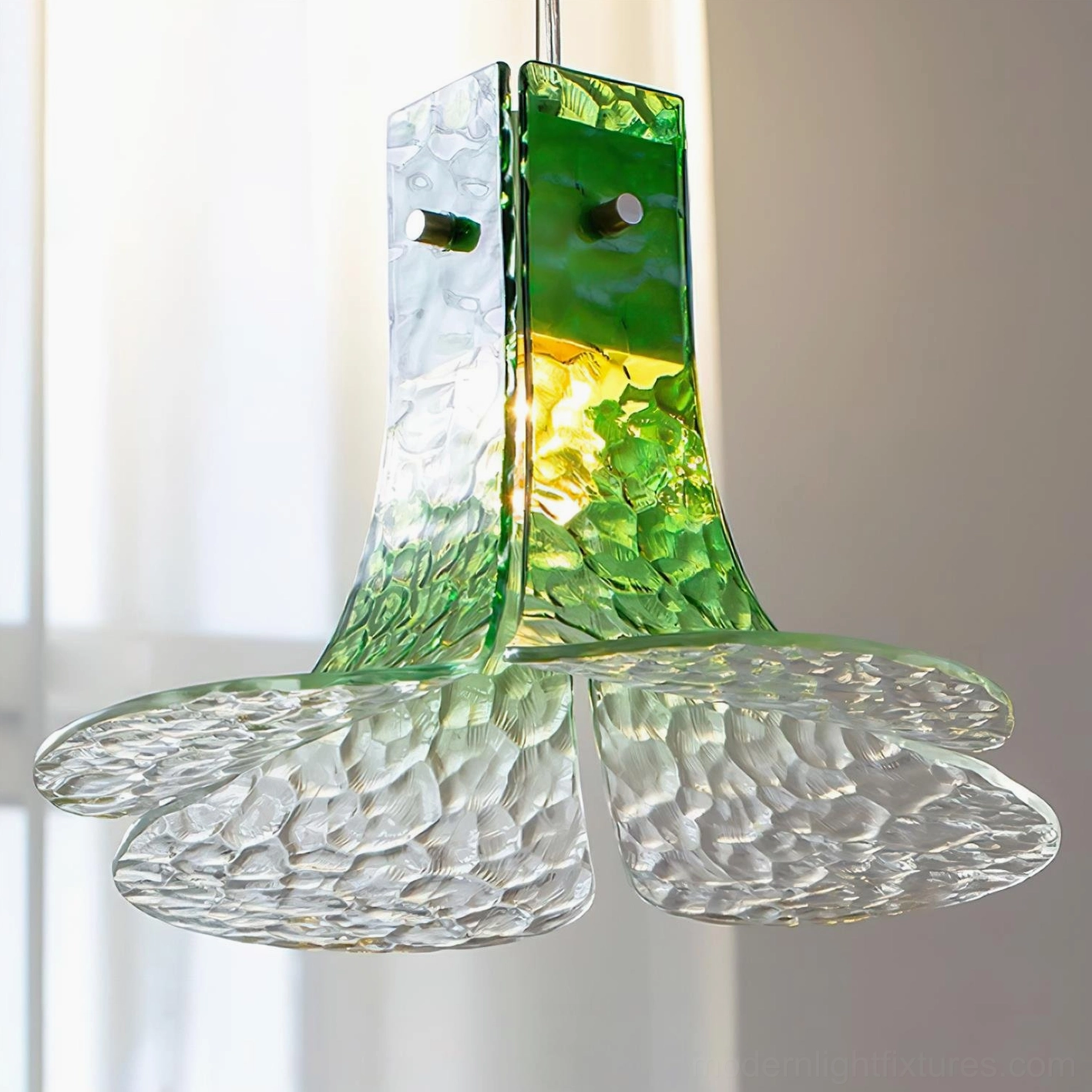 Floral glass pendant light installation showing screw-on fixture and adjustable hanging cord