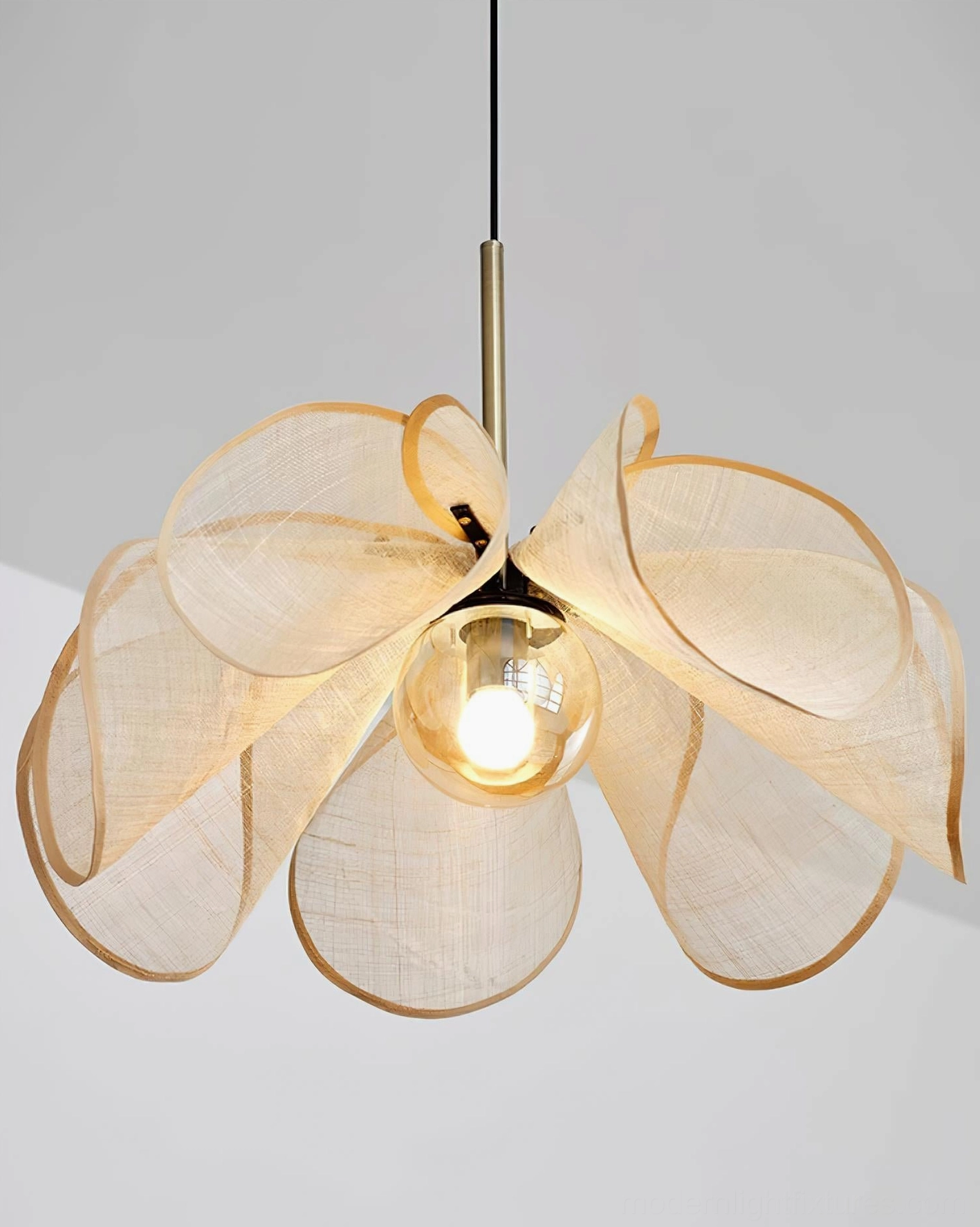 Jute petal shade pendant light showing three-dimensional flower silhouette form and artistic botanical inspiration