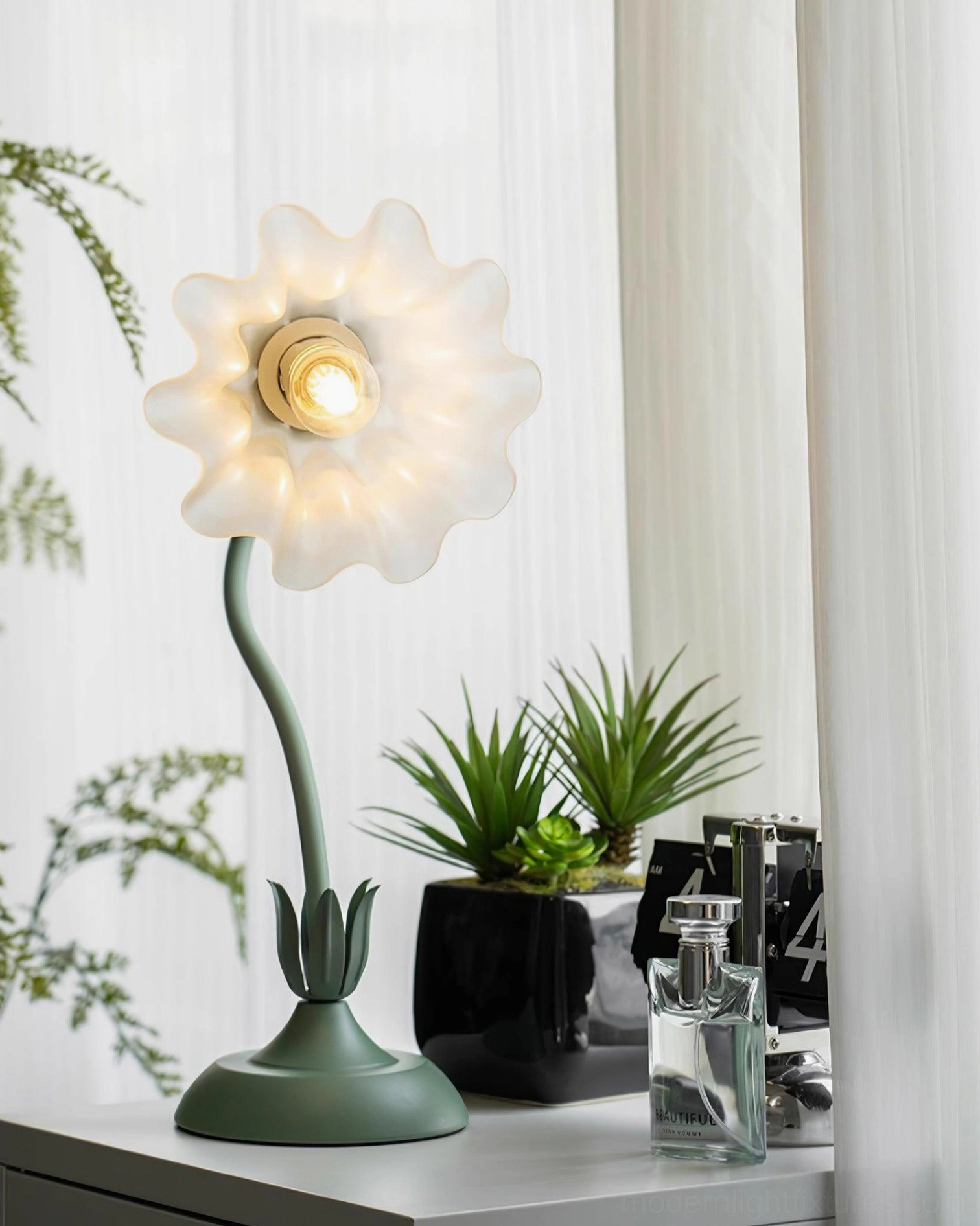 Modern botanical lily flower table lamp creating ambient light in cozy home reading nook