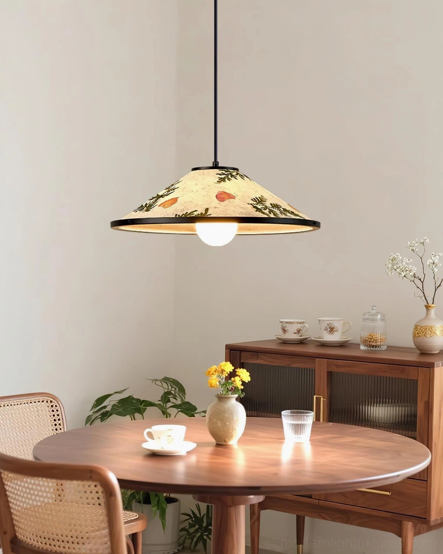 Botanical pendant lamp close-up detail showing embedded dried flowers petals and rice paper texture