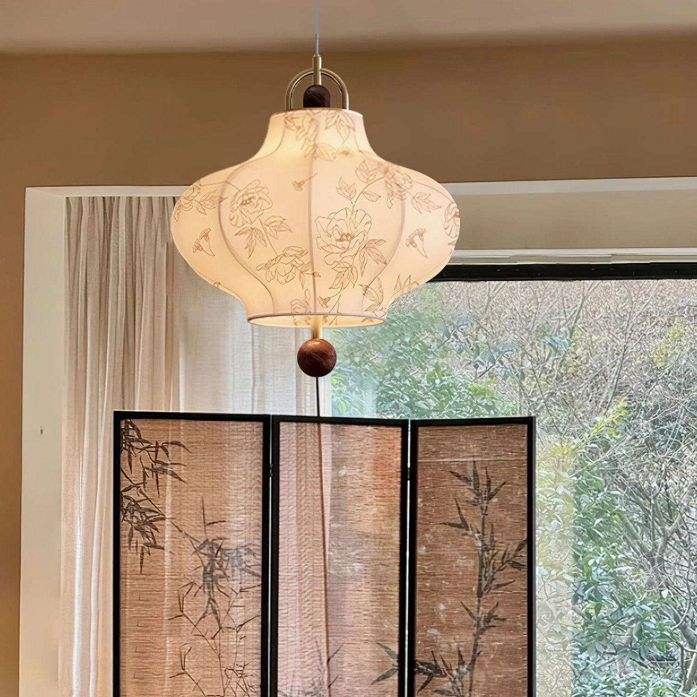 Botanical fabric pendant light with beige shade and walnut wood accent interior