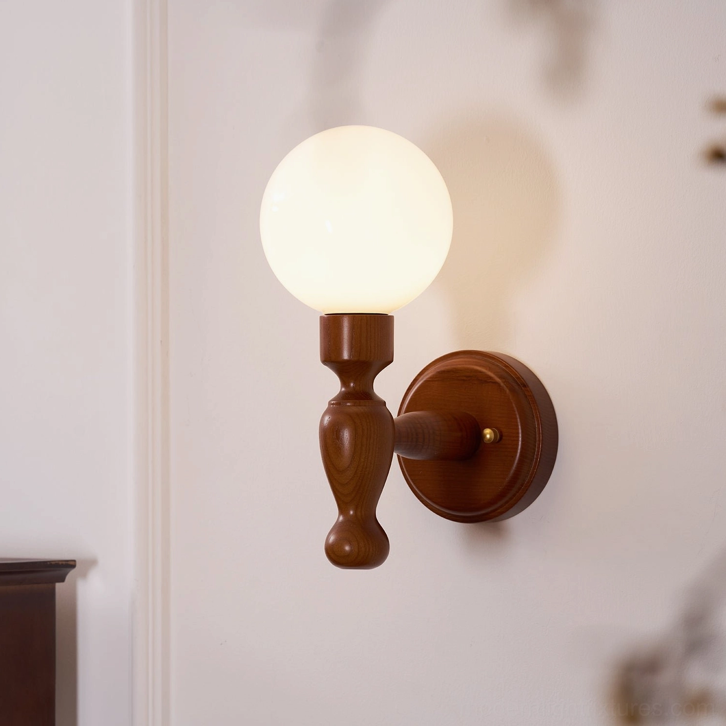 Contemporary wood wall sconce with botanical print shade, nature-inspired