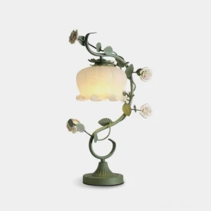 Botanical rose table lamp with sage green metal frame and frosted glass shade - front studio view