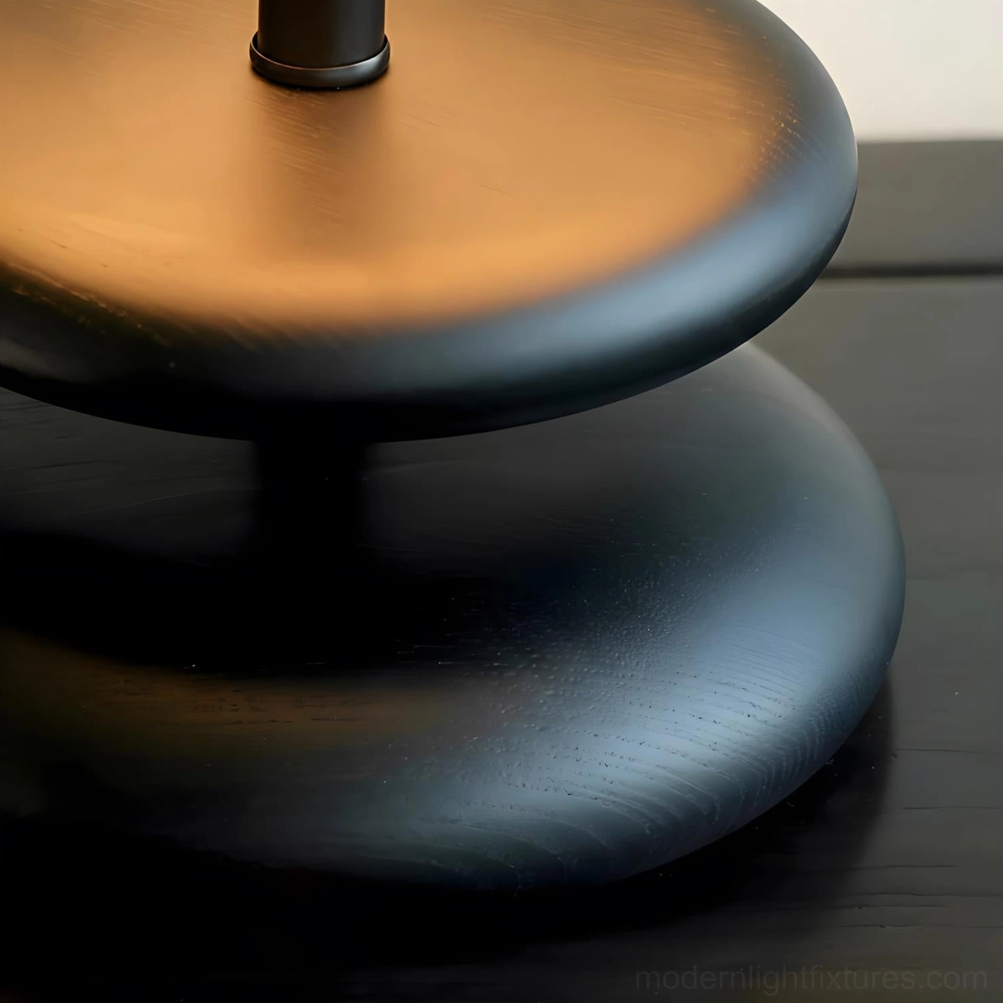 Botanical bamboo leaf table lamp detail shot showing warm fabric shade with intricate leaf pattern and sculptural base