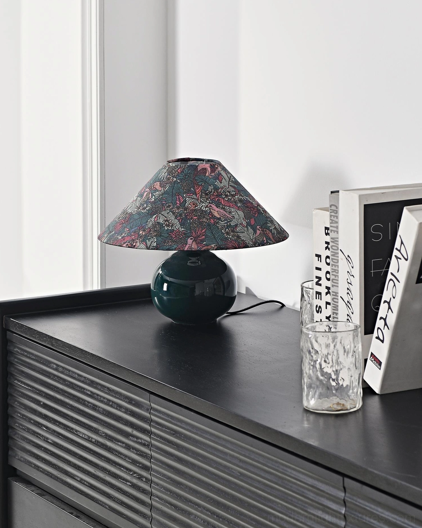 Contemporary botanical table lamp base showing high-gloss forest green ceramic finish with premium craftsmanship and durability
