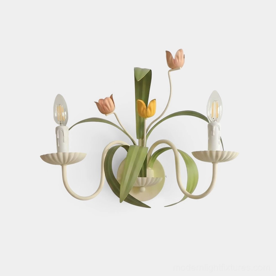 Botanical tulip wall sconce with dual candle-style bulbs - direct front view showcasing sculptured metal leaves and floral design