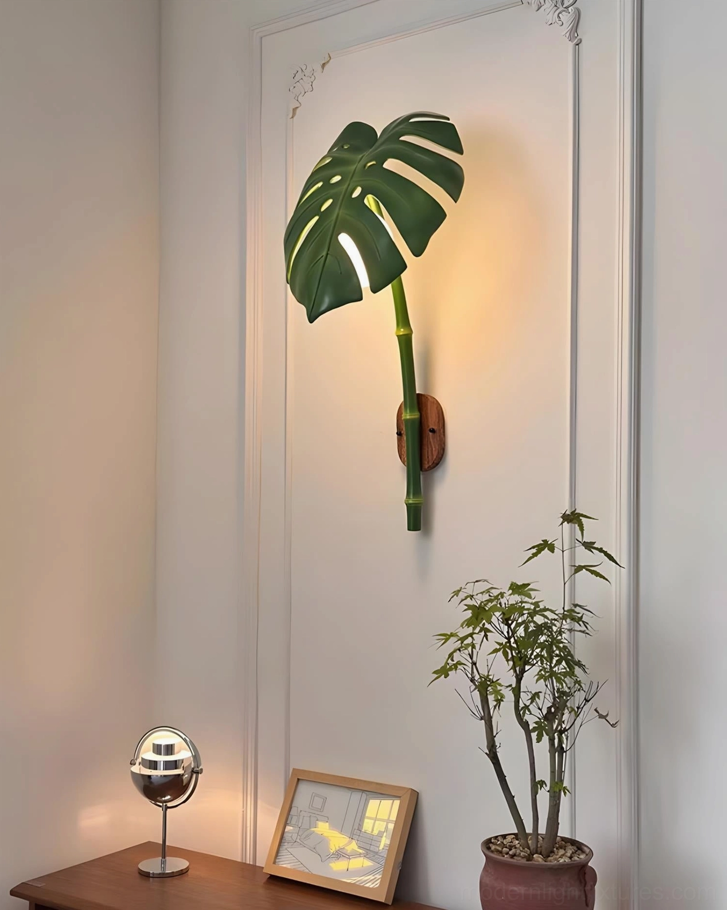 Contemporary botanical wall light with damp-rated construction suitable for bathroom spaces