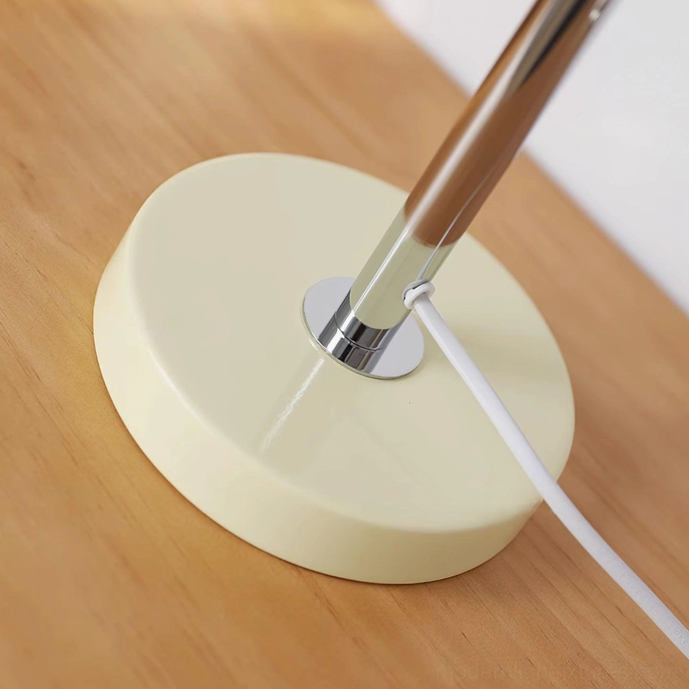 Bowie table lamp on nightstand showing practical bedside lighting with design elegance